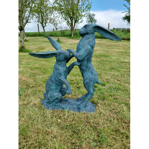 600 - Exceptional quality bronze sculpture of Hares at play {76cm H x 75cm W x 33cm D}