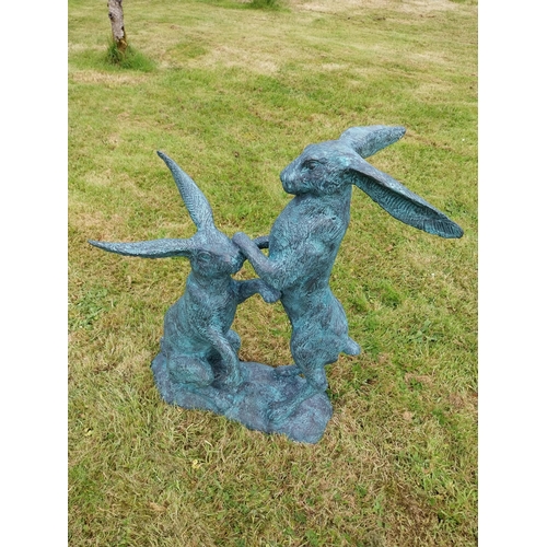 600 - Exceptional quality bronze sculpture of Hares at play {76cm H x 75cm W x 33cm D}