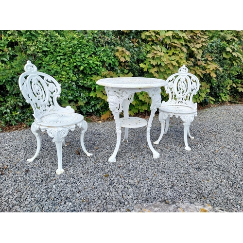 602 - 19th C. cast iron garden table with two matching chairs {Tbl. 68 cm H x 59 cm Dia. and Chairs 83 cm ... 