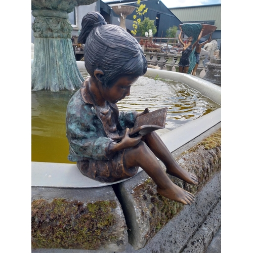 612 - Good quality bronze figure of a Girl reading {33 cm H x 20 cm W x 28 cm D}.