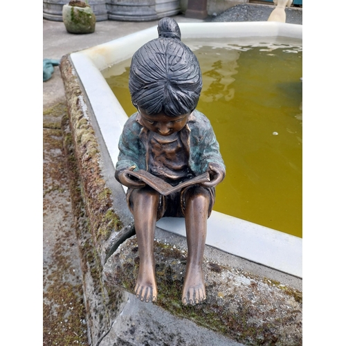 612 - Good quality bronze figure of a Girl reading {33 cm H x 20 cm W x 28 cm D}.