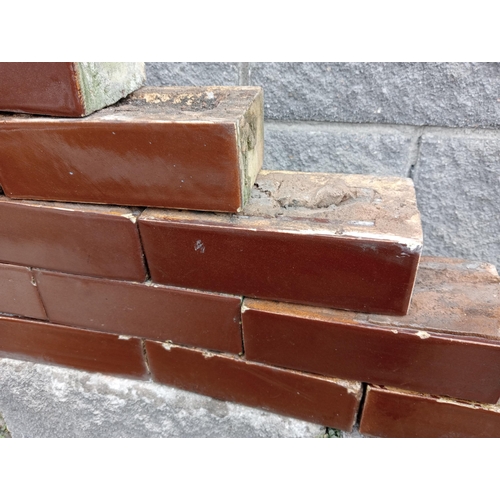 614A - Collection of one hundred and ten red glazed bricks {H 8cm x W 23cm x D 11cm }. (NOT AVAILABLE TO VI... 