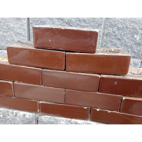 614A - Collection of one hundred and ten red glazed bricks {H 8cm x W 23cm x D 11cm }. (NOT AVAILABLE TO VI... 