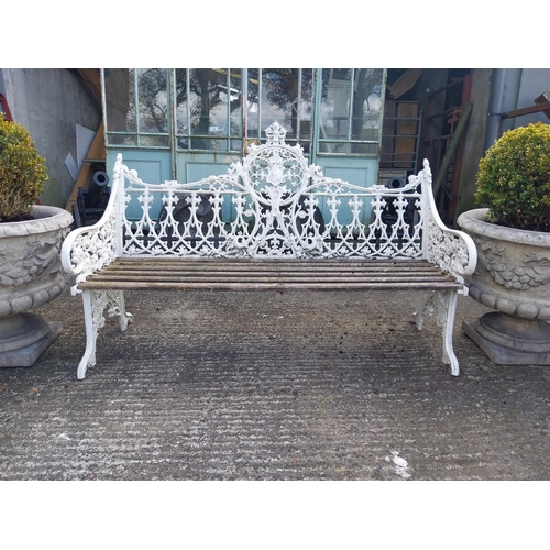 630 - Decorative cast alloy garden bench in the Victorian style {99 cm H x 150 cm W x 68 cm D}.