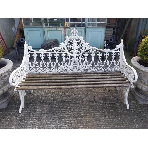 630 - Decorative cast alloy garden bench in the Victorian style {99 cm H x 150 cm W x 68 cm D}.