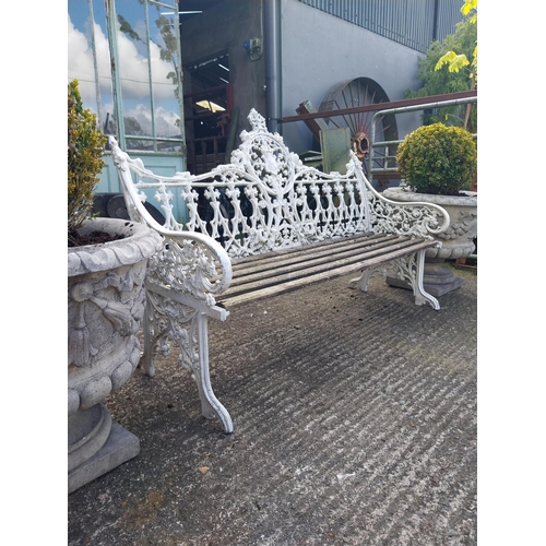 630 - Decorative cast alloy garden bench in the Victorian style {99 cm H x 150 cm W x 68 cm D}.