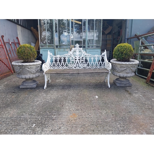 630 - Decorative cast alloy garden bench in the Victorian style {99 cm H x 150 cm W x 68 cm D}.