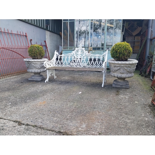 630 - Decorative cast alloy garden bench in the Victorian style {99 cm H x 150 cm W x 68 cm D}.