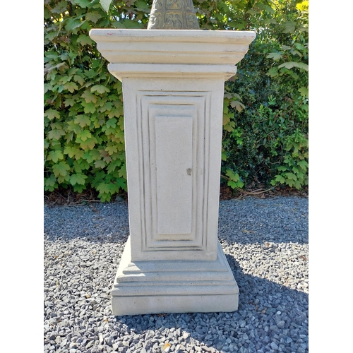 652 - Copper and metal Armorial sundial raised on moulded sandstone pedestal {158 cm H x 40 cm W x 40 cm D... 