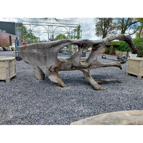 658 - Early 20th C. tree trunk bench {115 cm H x 303 cm W x 140 cm D}.