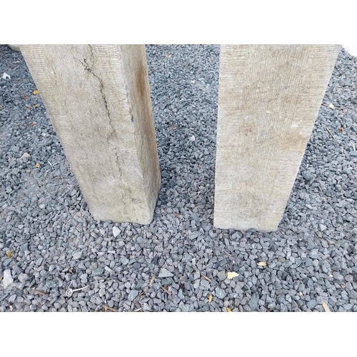 66 - Pair of 19th C. hand-cut limestone bollards with wrought iron tops {72 cm H x 21 cm W x 21 cm D}.