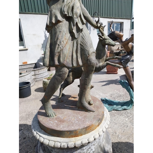 679 - Good quality cast iron life-size statue of The Huntress raised on composition pedestal {240 cm H x 1... 