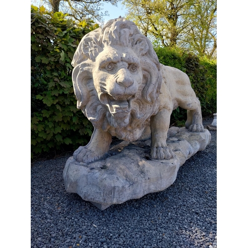 69 - Pair of exceptional quality moulded sandstone majestic Lions {132 cm H x 210 cm W x 80 cm D}.