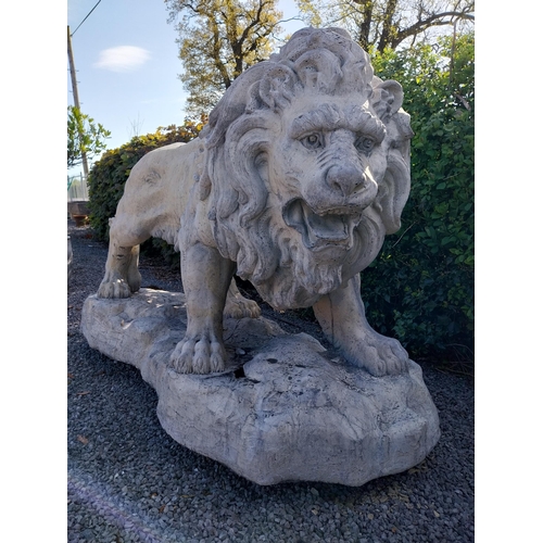 69 - Pair of exceptional quality moulded sandstone majestic Lions {132 cm H x 210 cm W x 80 cm D}.