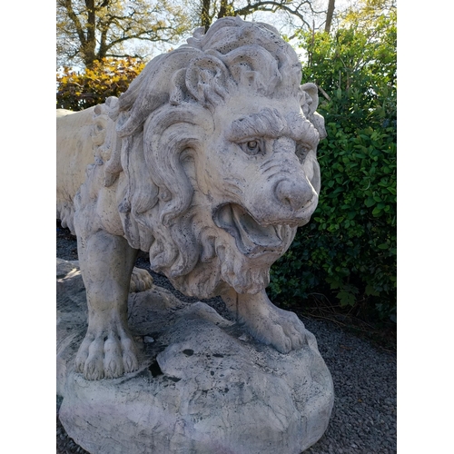 69 - Pair of exceptional quality moulded sandstone majestic Lions {132 cm H x 210 cm W x 80 cm D}.