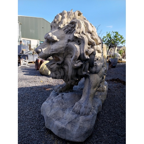 69 - Pair of exceptional quality moulded sandstone majestic Lions {132 cm H x 210 cm W x 80 cm D}.