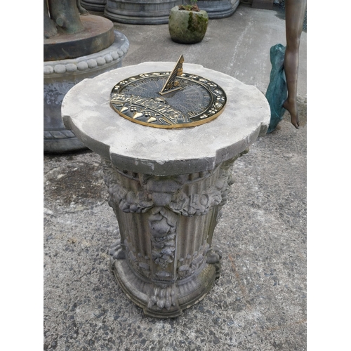 710 - Good quality bronze sundial raised on moulded stone pedestal decorated with lions mask {78 cm H x 48... 