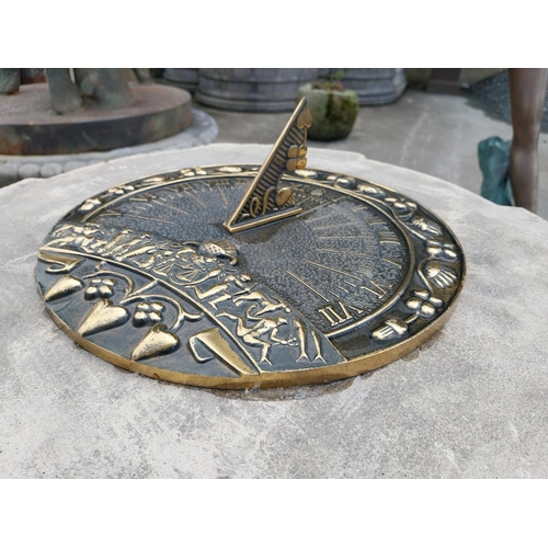 710 - Good quality bronze sundial raised on moulded stone pedestal decorated with lions mask {78 cm H x 48... 