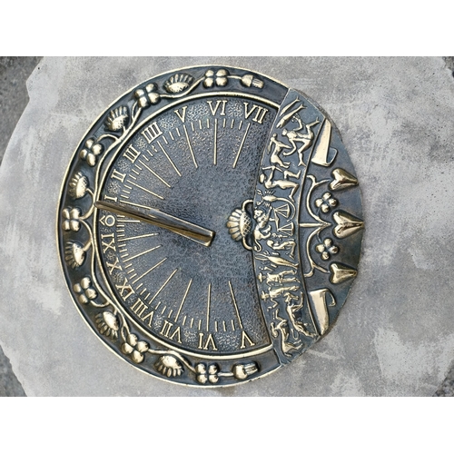 710 - Good quality bronze sundial raised on moulded stone pedestal decorated with lions mask {78 cm H x 48... 