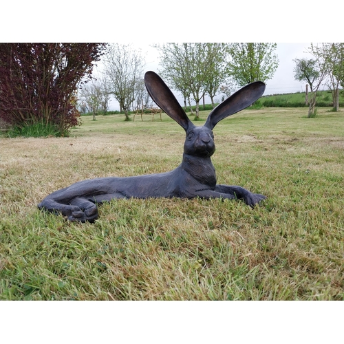 72 - Exceptional quality statue of a lying Hare with ears up  {61 cm H x 35 cm W x 20 cm D}.