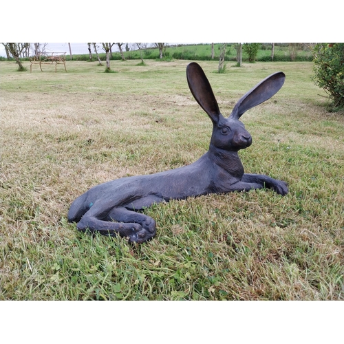 72 - Exceptional quality statue of a lying Hare with ears up  {61 cm H x 35 cm W x 20 cm D}.