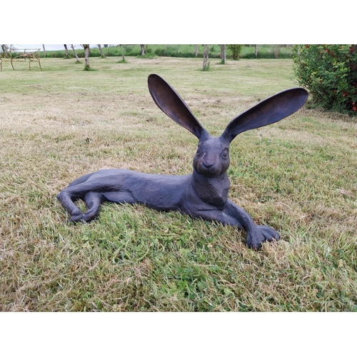 72 - Exceptional quality statue of a lying Hare with ears up  {61 cm H x 35 cm W x 20 cm D}.