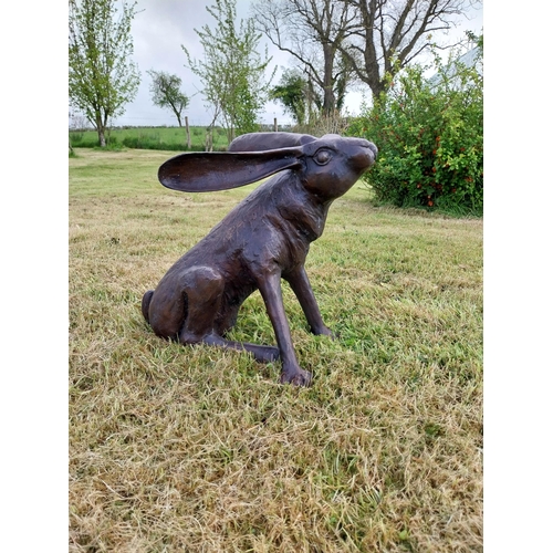 73 - Exceptional quality bronze statue of a seated Hare scratching ear  {36 cm H x 38 cm W x 23 cm D}.