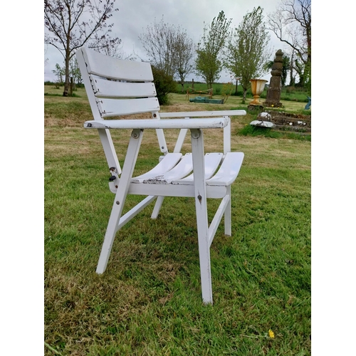 736 - Set of four painted wooden folding garden armchairs {85 cm H x 66 cm W x 54 cm D}.