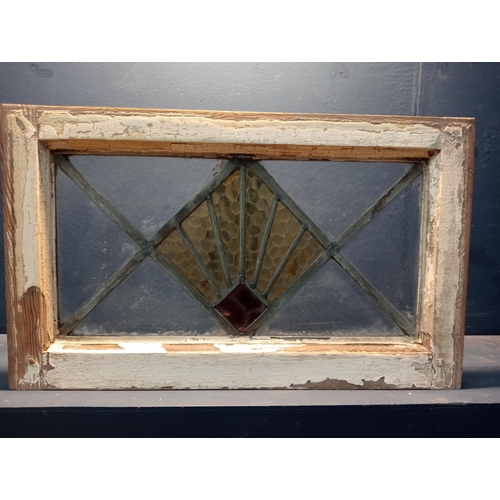 750 - Leaded stain glass window with red centre {H 41cm x W 69cm }. (NOT AVAILABLE TO VIEW IN PERSON)