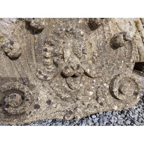 772 - Good quality aged moulded sandstone Lions mask wall plaque {53 cm H x 50 cm W x 9 cm D}.