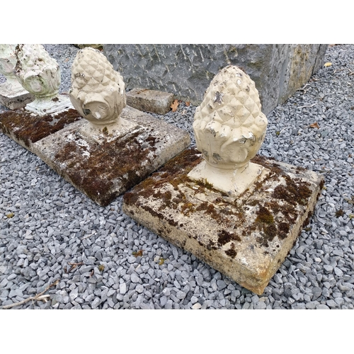 774 - Four concrete acorn finials {Three are 43 cm H x 38 cm W x 38 cm D and one is 38 cm H x 21 cm W x 21... 