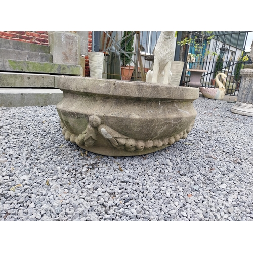 795 - Good quality carved sandstone planter decorated with swags {37 cm H x 80 cm W x 61 cm D}.