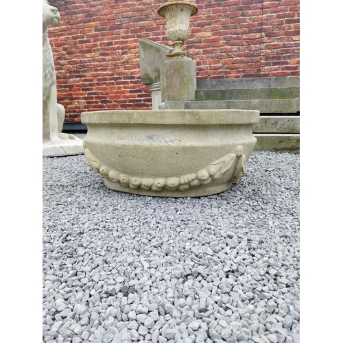 796 - Good quality carved sandstone planter decorated with swags {37 cm H x 80 cm W x 61 cm D}.