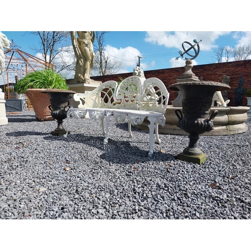 806 - Pair of decorative cast iron urns with lions mask handles {64 cm H x 67 cm Dia.}.