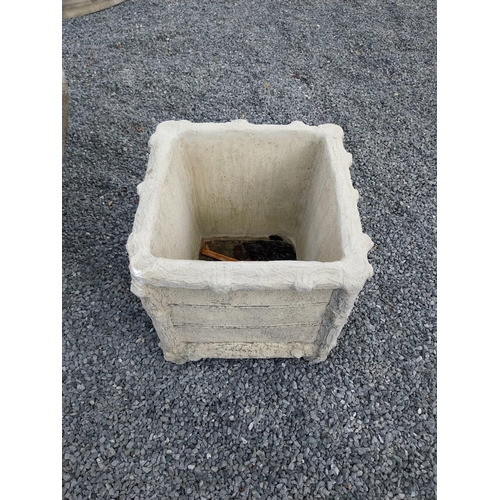 810 - Pair of moulded sandstone planters in the form of tree branches {57 cm H x 56 cm W x 56 cm D}.