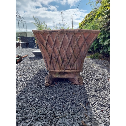 84 - Moulded terracotta rectangular lattice planters on Lions feet {52 cm H x 114 cm W x 56 cm D}.