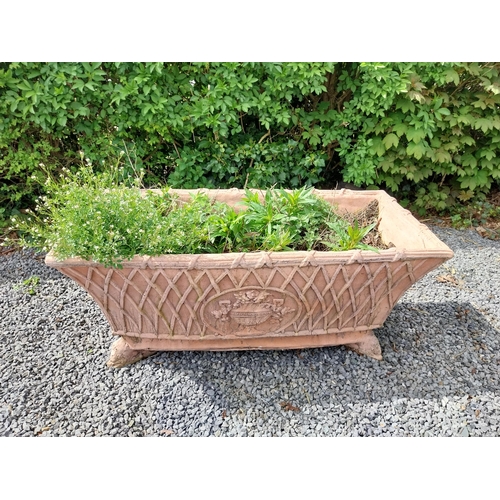 85 - Moulded terracotta rectangular lattice planters on Lions feet {52 cm H x 114 cm W x 56 cm D}.