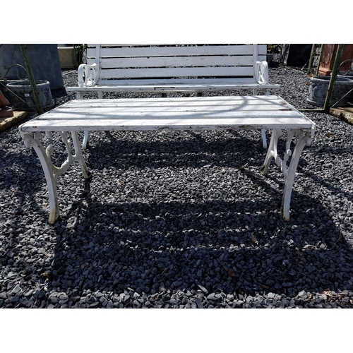 856 - Cast iron garden bench with wooden slats and matching coffee table {Bench 67 cm H x 155 cm W x 55 cm... 