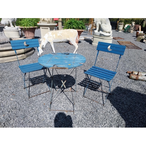 859 - Wooden and metal garden table with two matching chairs {Tbl. 71 cm H x 60 cm Dia. and Chairs 84 cm H... 