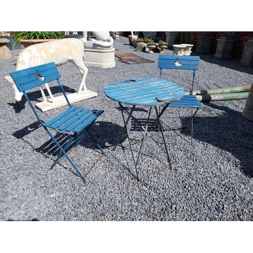 859 - Wooden and metal garden table with two matching chairs {Tbl. 71 cm H x 60 cm Dia. and Chairs 84 cm H... 