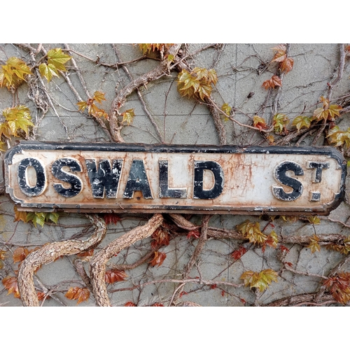 891 - Cast iron Street sign Oswald St {H 18cm x W 85cm }. (NOT AVAILABLE TO VIEW IN PERSON)