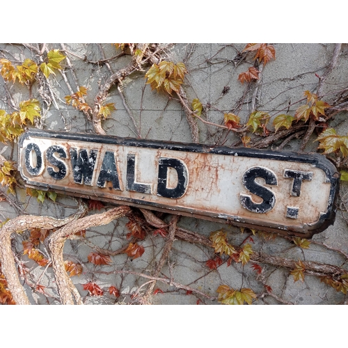 891 - Cast iron Street sign Oswald St {H 18cm x W 85cm }. (NOT AVAILABLE TO VIEW IN PERSON)