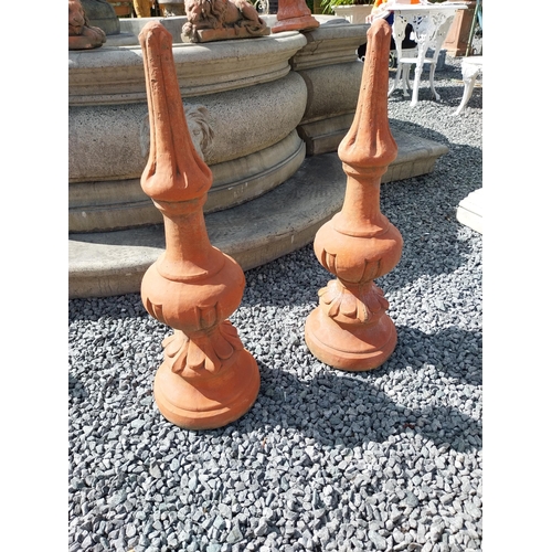 897 - Pair of moulded terracotta finials {74 cm H x 23 cm Dia.}.