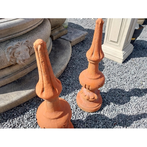 897 - Pair of moulded terracotta finials {74 cm H x 23 cm Dia.}.