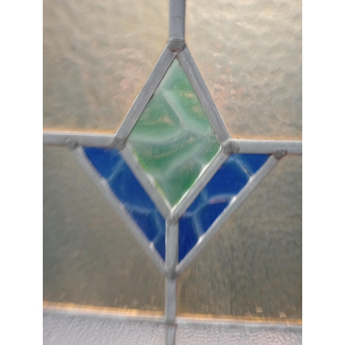 900 - Leaded stain glass window with blue and green centre {H 89cm x W 64cm }. (NOT AVAILABLE TO VIEW IN P... 