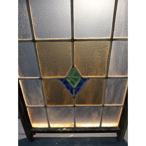 900 - Leaded stain glass window with blue and green centre {H 89cm x W 64cm }. (NOT AVAILABLE TO VIEW IN P... 