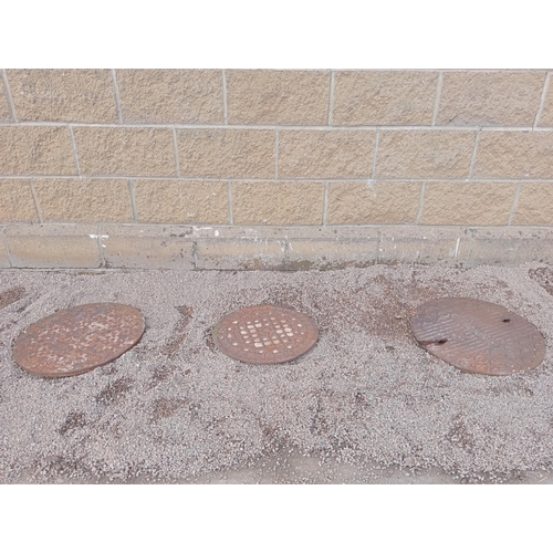 903 - Three cast iron manhole covers {two covers Dia 50cm x One at 30 cm Dia.}. (NOT AVAILABLE TO VIEW IN ... 