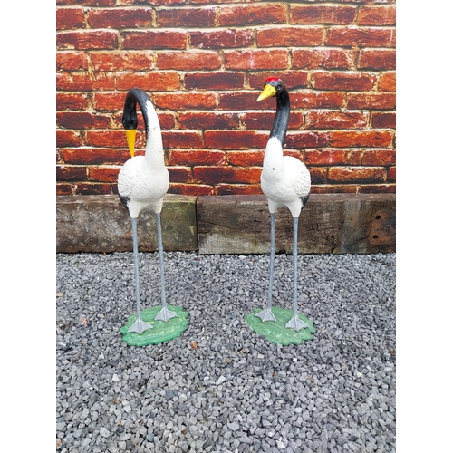 908 - Pair of cast iron statues of Cranes {76 cm H x 24 cm W x 20 cm D and 75 cm H x 23 cm W x 19 cm D}.