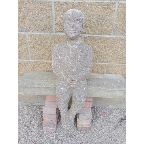 915 - Stone statue of a Boy sitting {H 70cm x W 26cm x D 30cm }. (NOT AVAILABLE TO VIEW IN PERSON)