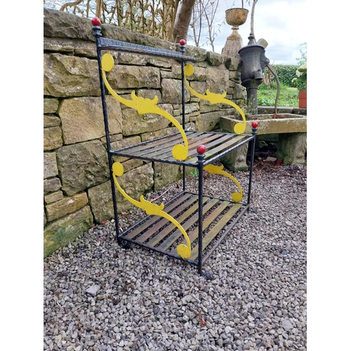 918 - Painted wrought iron two-tiered plant stand {90 cm H x 66 cm W x 43 cm D}.